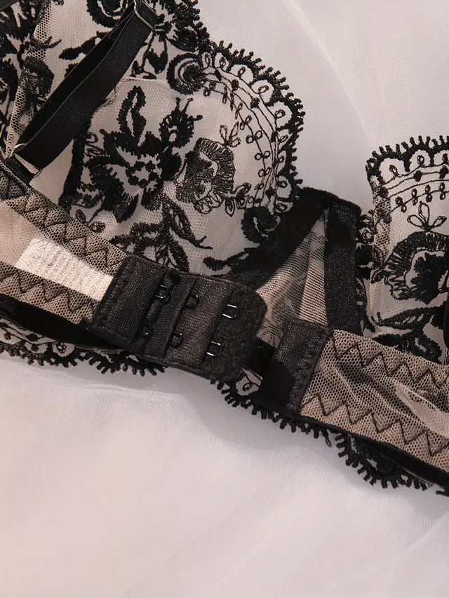 Black sheer embroidered lingerie set – close detail view of strap