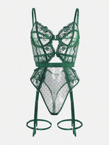 Green lace lingerie set on a white background